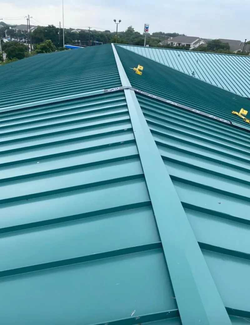 Green commercial metal roof ridge and valley for Metal Roof Repair in Petal